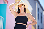 Happy woman on holiday, spring portrait city adventure and weekend lifestyle in Los Angeles. Summer fashion sun hat, smile and young Asian gen z girl on urban travel vacation and happiness in a town