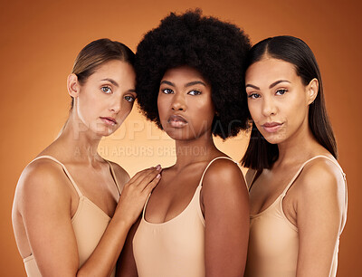 Buy stock photo Beauty, diversity and skincare with a model woman group standing in studio on a brown background to promote real. Hair, face and skin with a female group posing for haircare or wellness together