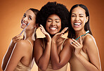 Beauty, smile and dental with women and toothbrush for teeth, oral healthcare and hygiene. Orthodontics, lifestyle and diversity with girls against orange background for wellness, clean or dentistry