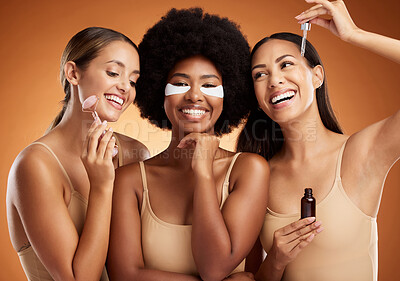 Buy stock photo Beauty, skincare and diversity with women and product of facial and wellness, cosmetics and youth routine. Luxury, spa and relax with model in brown background studio for clean, creative and health