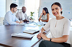 Leader, portrait and woman at meeting table for sales growth, marketing or business strategy with coworkers. Planning, vision and ceo, manager or employee sitting in company boardroom with documents.