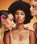 Flowers, beauty and portrait of women with makeup standing in a studio with an orange background. Skincare, diversity and face of beautiful girl models with natural floral, cosmetics and wellness.