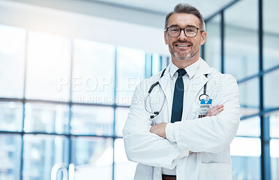 Buy stock photo Doctor, man and happy with arms crossed in hospital for medical, career and happiness for portrait. Medic, smile and work in clinic for healthcare, wellness and health while working in Washington DC