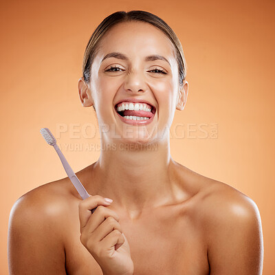 Brushing teeth, woman skincare and dental portrait wellness, health and cleaning cosmetics on orange studio background. Happy young model funny face, tongue mouth and toothpaste, toothbrush and smile