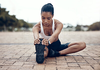 Buy stock photo Fitness, sports and woman stretching legs in warm up to start training, exercise and cardio workout in Lisbon. Runner, Athlete and flexible girl holding running shoes for a healthy hamstring stretch