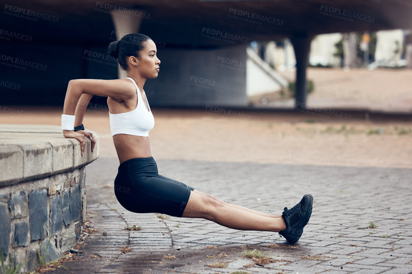 Buy stock photo City exercise, woman and dips workout, fitness and challenge for wellness, focus mindset and urban training in Brazil. Young sports athlete, tricep stretching and power for body muscle performance