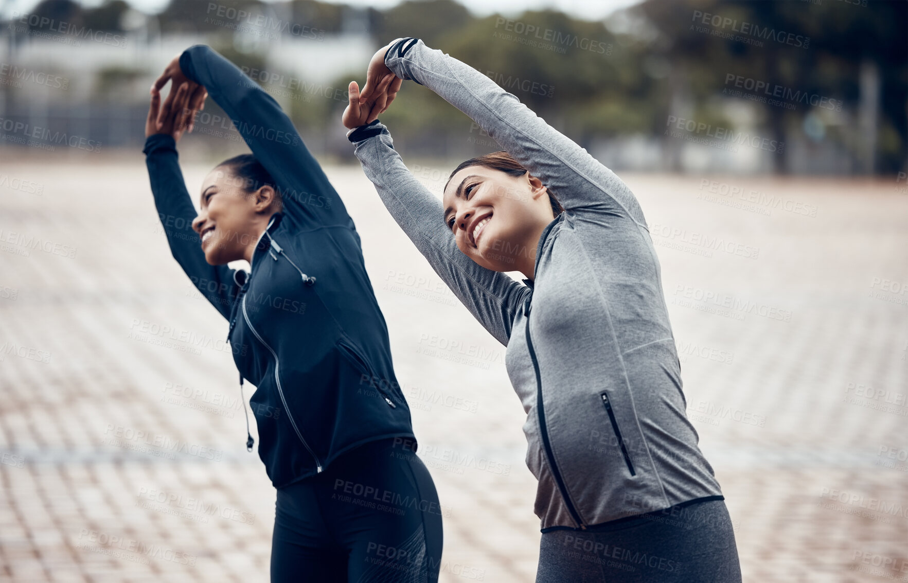 Buy stock photo Fitness, friends and stretching with women in city for sports training, workout and health together. Exercise, wellness and   running with girl athletes in outdoor for teamwork, goals and performance