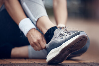 Buy stock photo Woman, running shoes and city fitness for workout, exercise and training in wellness health, heart cardio or marathon. Zoom, sports trainers and runner hands ready for urban activity energy or goals 