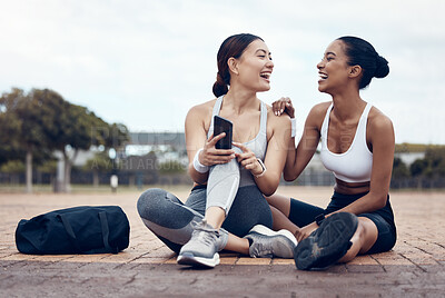 Buy stock photo Phone, fitness and women on social media in the city of London after workout together in the street. Happy, smile and healthy athlete friends with funny mobile app on tech after training outside