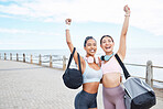 Fitness, runner women portrait for success at beach sidewalk with victory hand in Los Angeles. Running, training and workout goal achievement with happy and proud friends celebrating progress.

