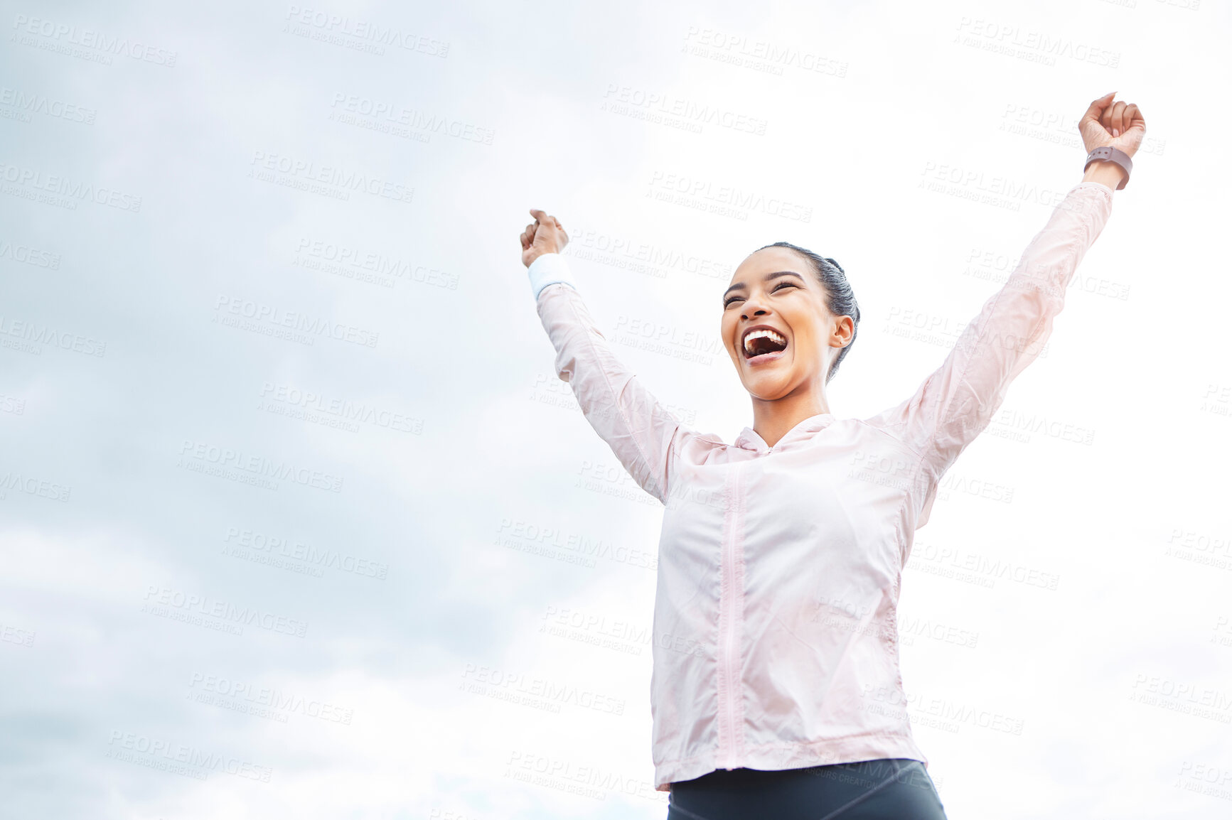 Buy stock photo Excited, fitness success and winning woman with power sign, exercise celebration and clouds sky mock up for advertising. Happy, energy and wellness sports runner person with workout goal achievement