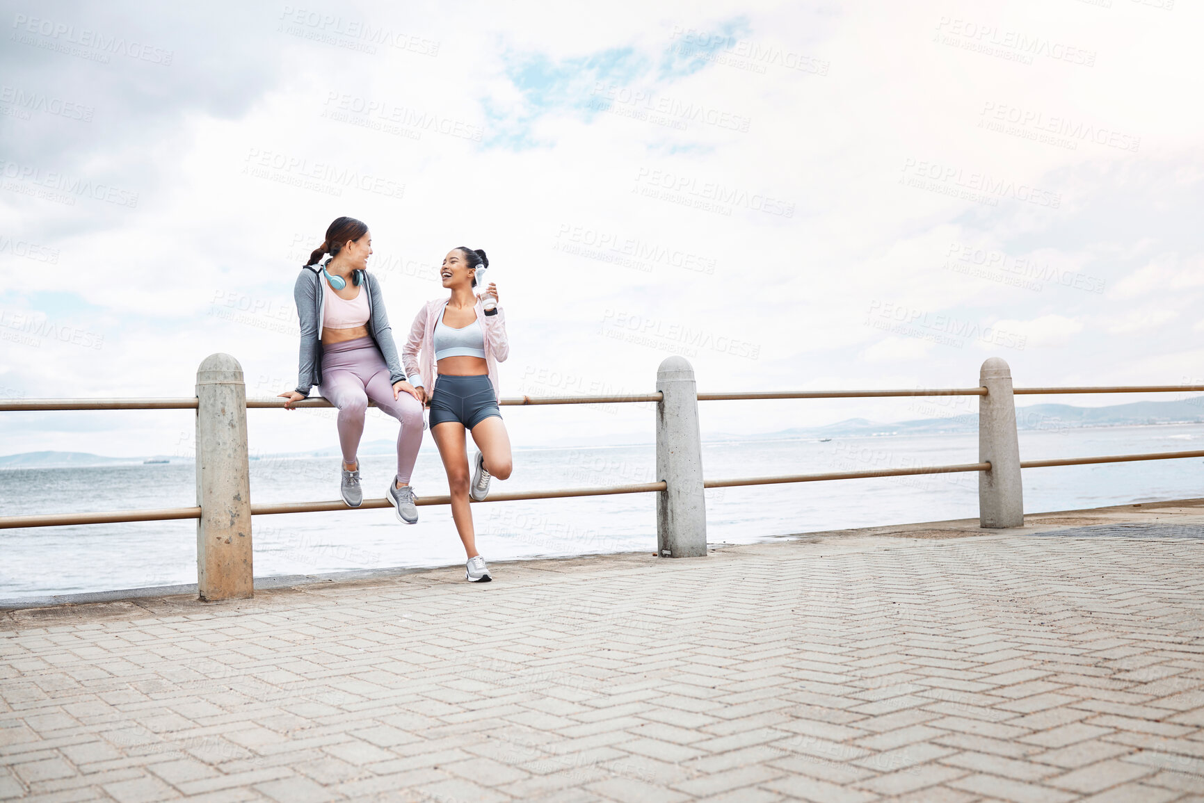 Buy stock photo Exercise, women and friends outdoor after training, workout and fitness for health, happy and relax together. Female trainers, girls and athlete being healthy, doing cardio and sportswear or resting