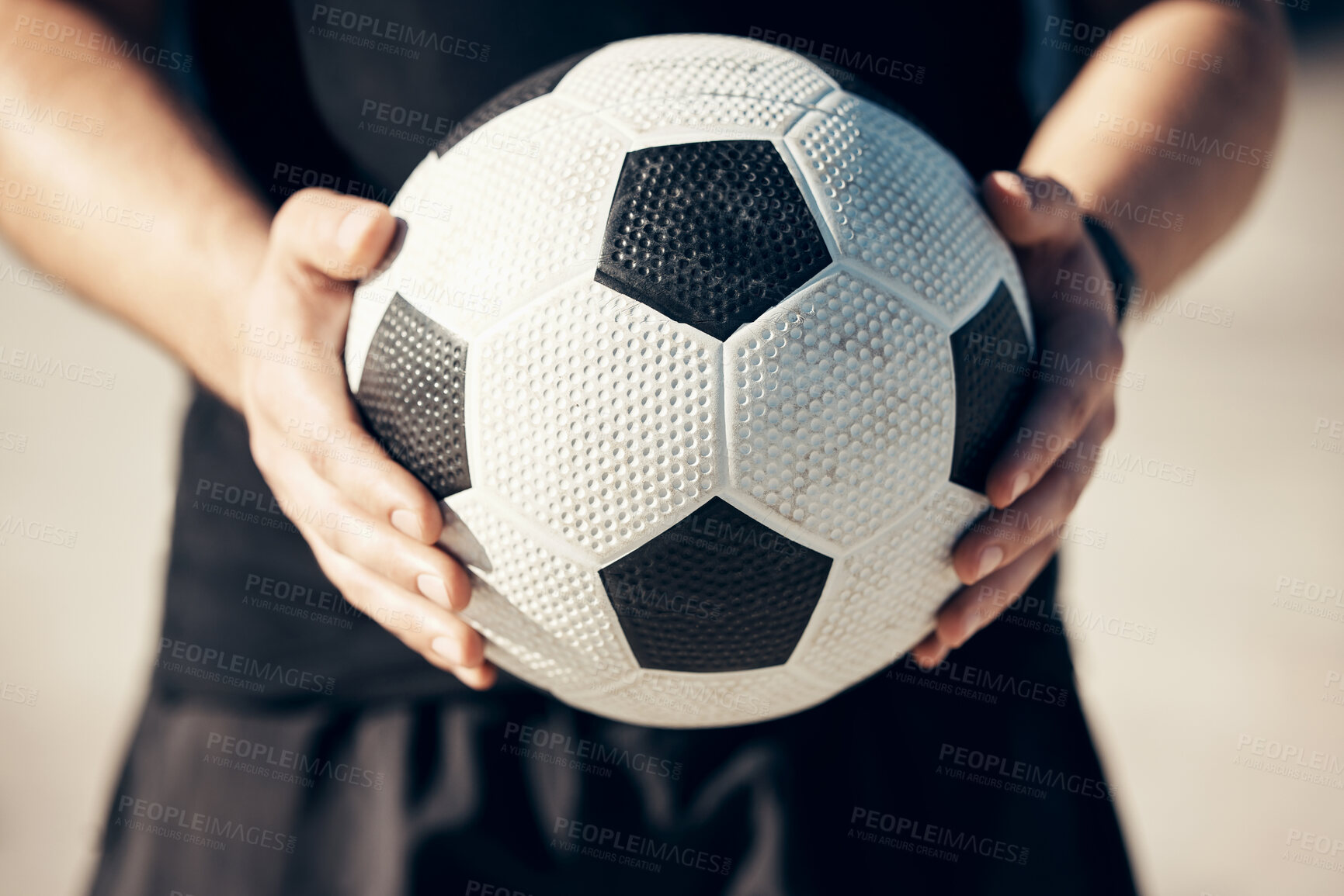 Buy stock photo Soccer, football and ball sports in hands of man standing outside for exercise, training or practice for competitive game, match or tournament. Athlete male ready for workout, fitness and to play