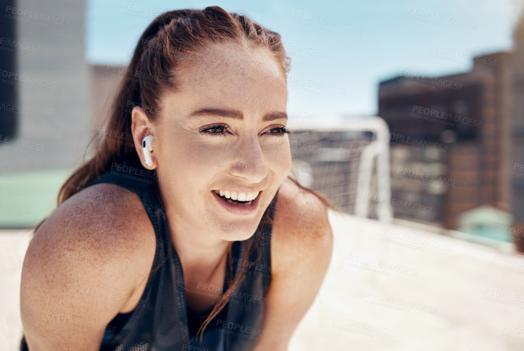 Buy stock photo Woman, smile and rest on rooftop for soccer with music, game and happy in sports, workout or fitness. Girl, football and face with radio, song or track in sun, relax and training on building in city