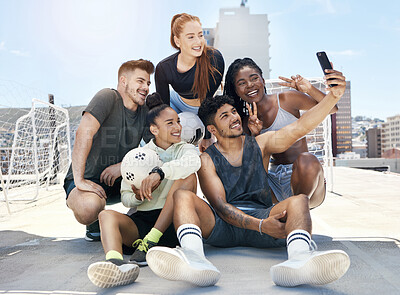 Buy stock photo Soccer, selfie and friends in the city for sports, training and exercise as a team. Happy, excited and athlete group with peace, phone photo and happiness during football for fitness on a street