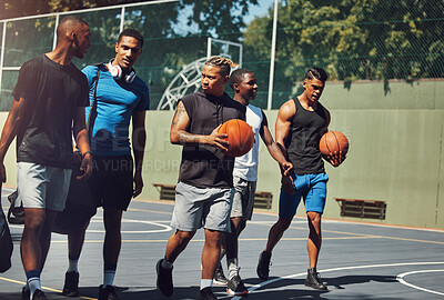Sports, team and basketball player friends walking off together after street game, competition or practice match. Basketball court, fitness and black people talking after workout or training exercise