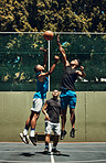 Sports, start and men jump in basketball training match, cardio exercise and fitness workout on a basketball court. Challenge, healthy and young African players jumping high in game action for a tip