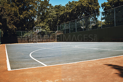 Buy stock photo Sports, basketball court and nature, outdoor park and  space for youth to exercise, workout and play in summer. Basketball, fitness and health, playground with trees and motivation for playing game.