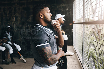 Buy stock photo Baseball, man and watching game with a ball in a sports dugout with his team in club uniform. Latino men watch baseball game on the bench together or waiting to start training, workout or practice   