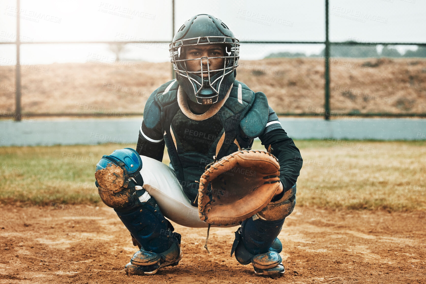 Buy stock photo Baseball, catcher and sports with man on field at pitchers plate for games, fitness and health in stadium park. Helmet, glove and uniform with athlete training for workout, achievement and exercise