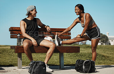 Exercise, stretching and sports couple relax in park, talking while getting ready for sport, training and wellness workout. Athletic, woman and man excited for recreation fun outdoors together