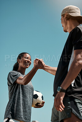 Buy stock photo Handshake, soccer and team motivation, game goal and competition celebrate with blue sky mock up for marketing or advertising. Inclusion, support and solidarity sign of football fitness people mockup