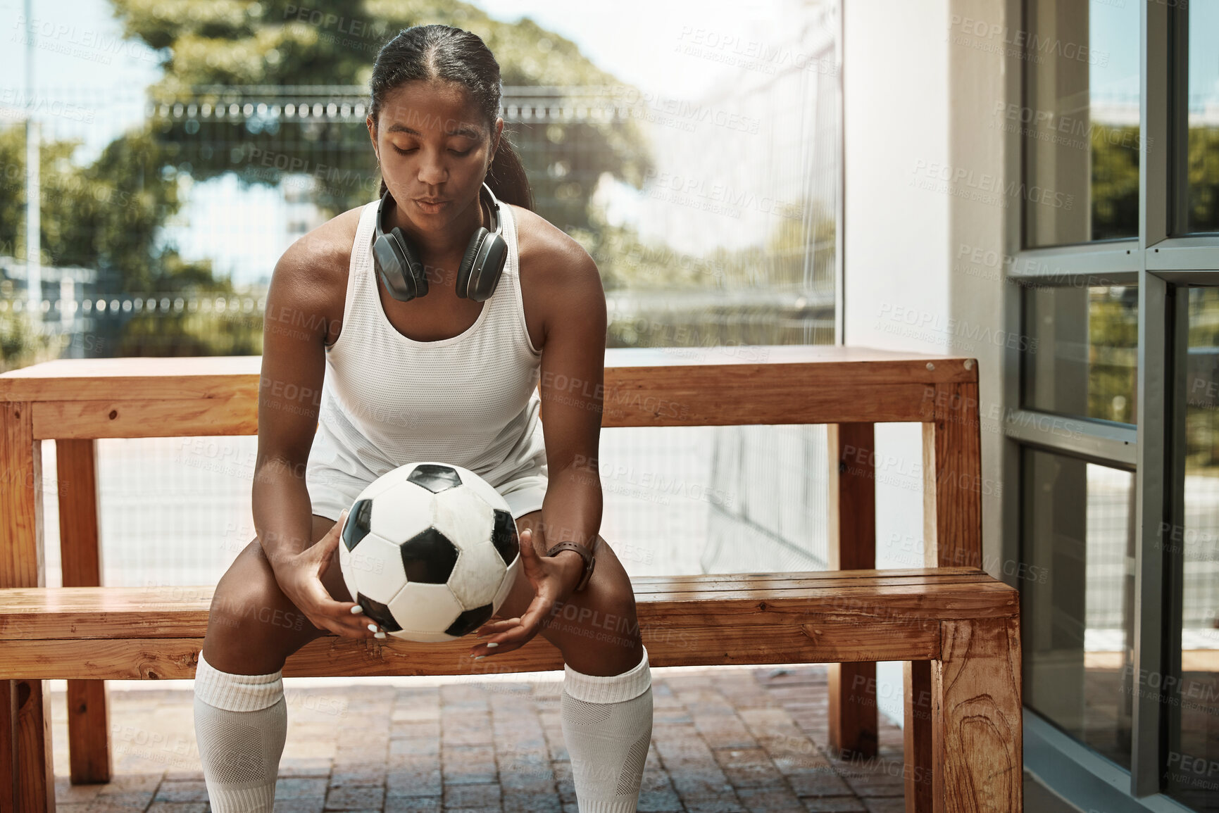 Buy stock photo Woman, soccer player and thinking of match goals, game strategy and sports exercise in fitness break. Soccer ball, football and ideas in training, workout or wellness with music motivation headphones