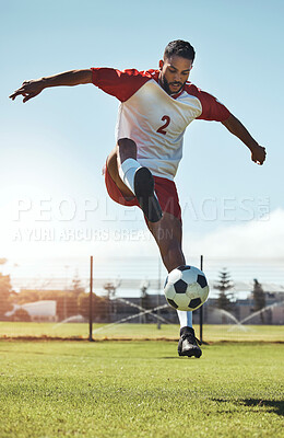 Buy stock photo Man, soccer and ball tricks in sports, fitness and exercise for training, workout or practice on the field in the outdoors. Athletic active soccer player in football sport trick, motivation or cardio