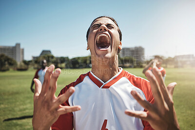 Buy stock photo Happy, winning and soccer playing screaming in joy during a match or training on an outdoor field. Success, fitness and excited man athlete at a football game with achievement or goal on sports pitch