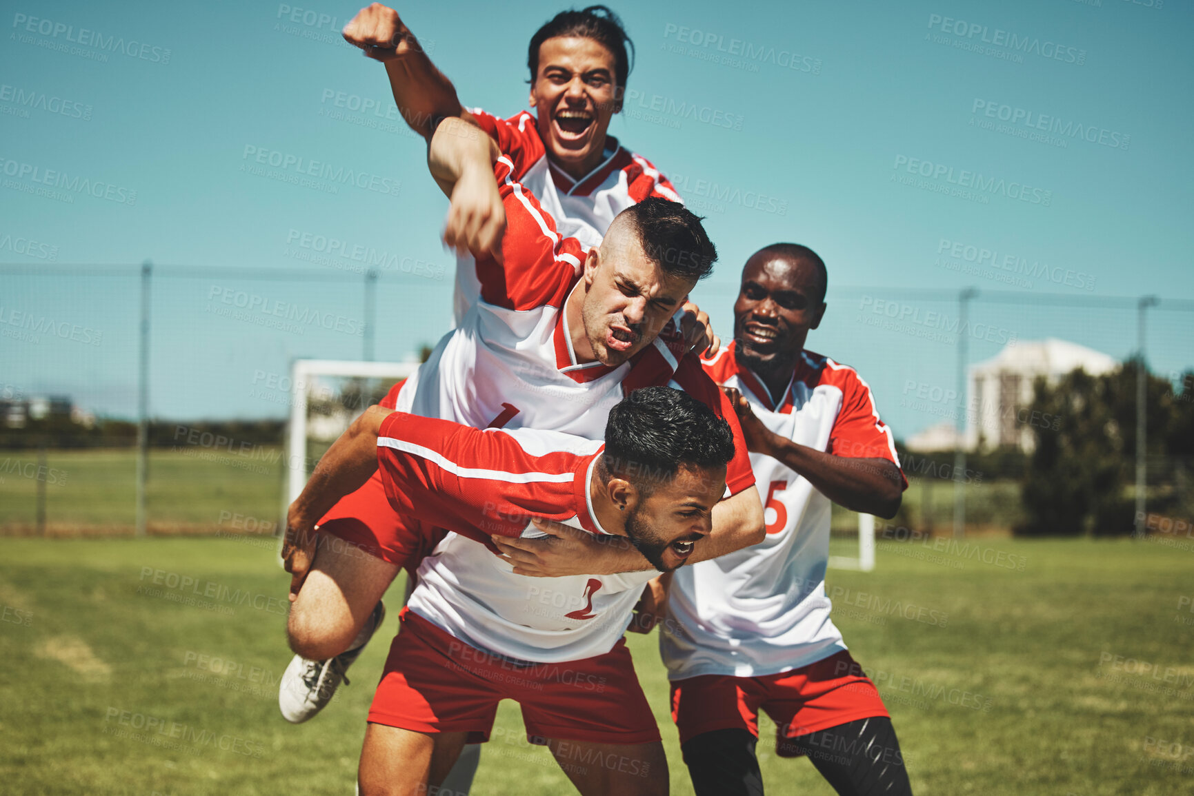 Buy stock photo Soccer player, soccer and soccer field, winner and team, diversity and celebrate goal, athlete happy and sports win. Sport, fitness and young men celebrating, outdoor game and team spirit, piggy back