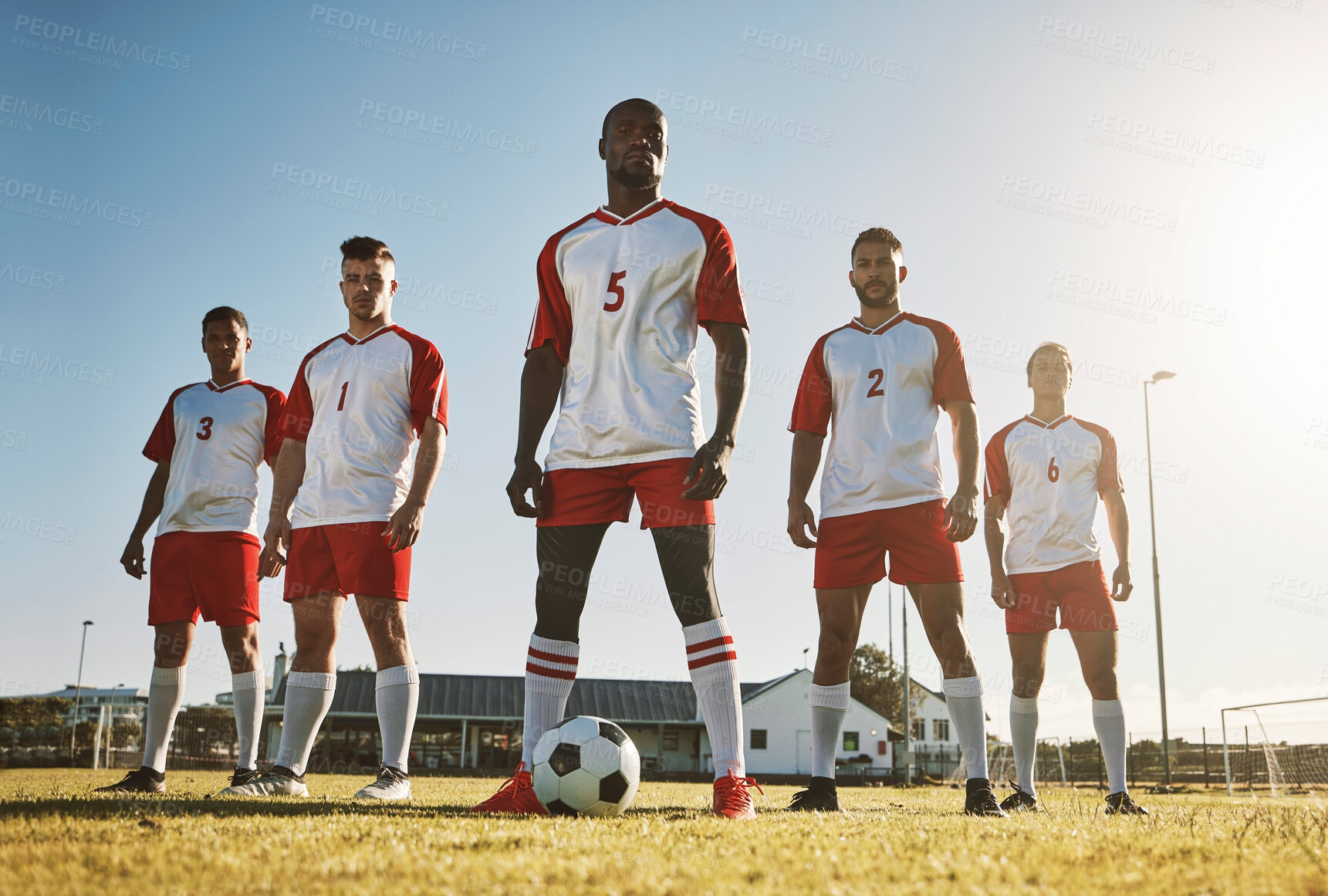 Buy stock photo Soccer player, team and sports training on soccer field by men standing with ball, power and strong mindset. Football, fitness and man football players united in support on football field for workout