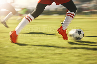 Buy stock photo Soccer, sports and running with the shoes of a man athlete on a grass pitch or field during a game. Football, fitness and training with a male player dribbling during a match or cardio workout