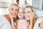Facial portrait of child, grandmother and mother bonding in kitchen for family happiness and love at home in summer. Happy mom, young girl kid and elderly woman with smile on face and bond together 