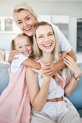 Buy stock photo Portrait of grandmother, mother and girl child with smile sitting on sofa to relax, bond and hug. Happy grandma, mom and kid relaxing on couch together in living room of the family home in Australia.