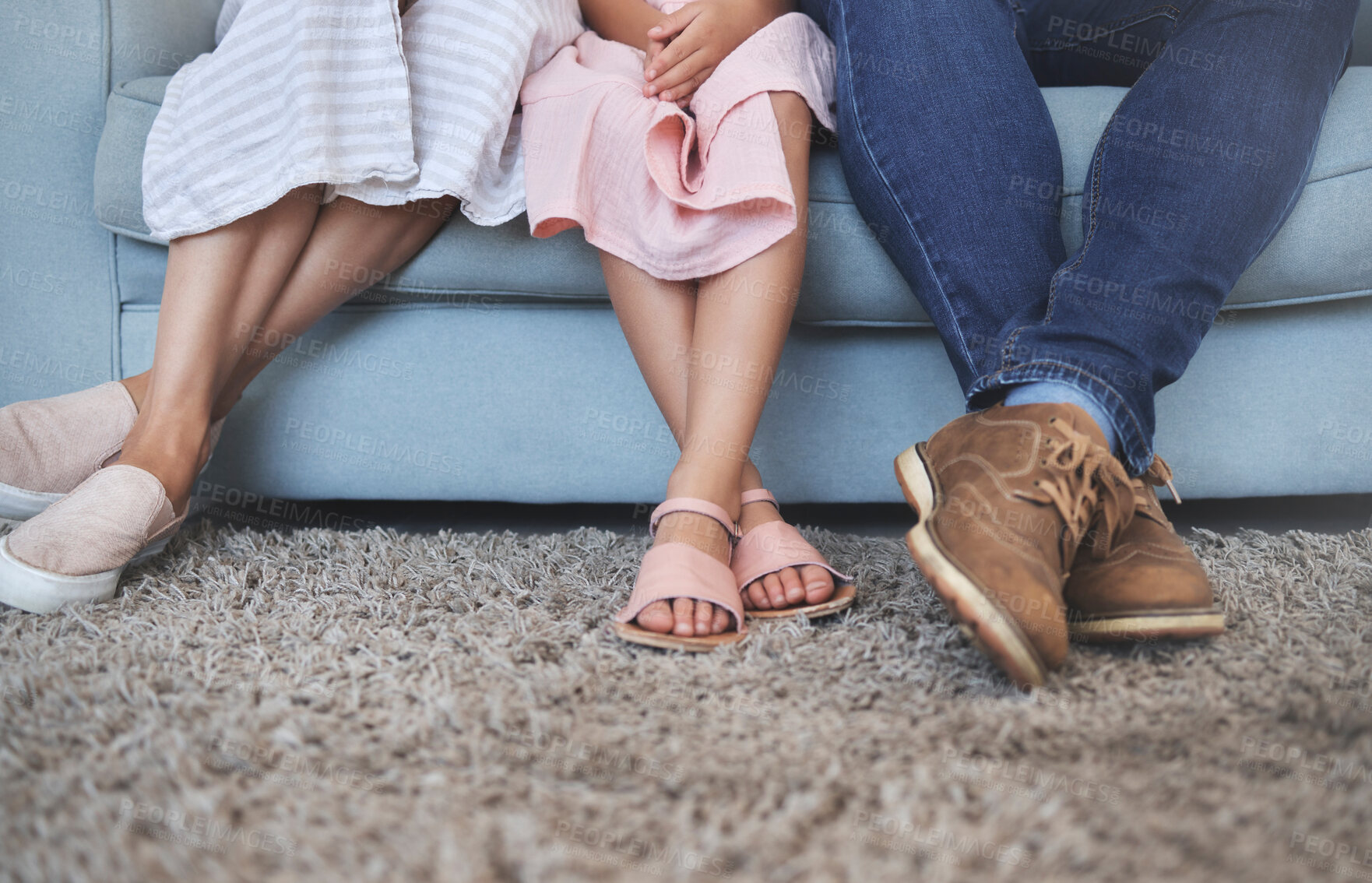 Buy stock photo Feet of mom, dad and kid on sofa watching tv, bonding and relax on weekend. Family, love and parents spending quality time with girl in living room relaxing, watching movie and sitting together