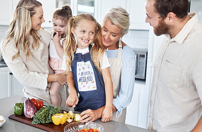 Buy stock photo Big family, salad and kitchen with grandmother, children and parents for food education, teaching and nutrition support. Senior woman, kids cooking healthy lunch and helping together in family home