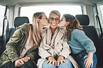 Family, kiss and road trip with a girl, mother and grandmother in the backseat of a car for a drive. Love, travel and transport with a senior woman, daughter and granddaughter on vacation or holiday