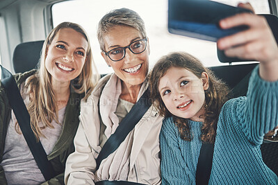 Buy stock photo Girl, mother and grandmother in car selfie with phone, road trip and transport with picture for social media. Family travel, transport, or holiday with smartphone for internet post with happy smile
