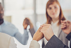 Hands, support and trust with a business team in solidarity during a prayer meeting in their office. Collaboration, community and faith with a diversity group hand in hand in the boardroom at work