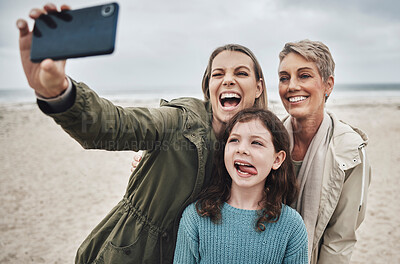 Buy stock photo Beach, grandma and child selfie with phone for happy family holiday break together in Canada. Mother, daughter and grandmother capture joyful picture for social media on ocean leisure walk.

