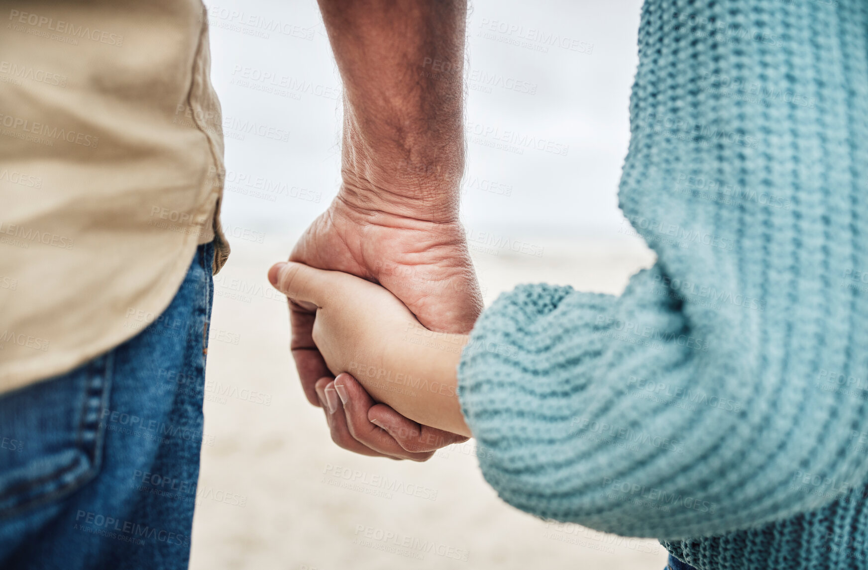 Buy stock photo family, beach and father holding hands with kid in support, child care trust and love while enjoy peace, freedom or bond. Quality time, travel and young youth girl and dad relax together on calm sand