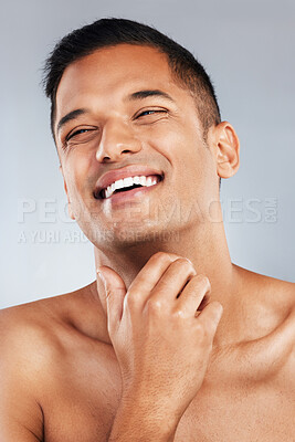 Buy stock photo Happy, man and smile with teeth for dental healthcare, clean hygiene and skin against a grey studio background. Satisfied male smiling in happiness for hygienic oral, mouth and gum care treatment