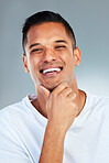 Man, thinking and portrait smile with teeth in fresh or clean hygiene against a grey studio background. Happy male smiling for healthy lifestyle in satisfaction for dental, mouth and oral or gum care