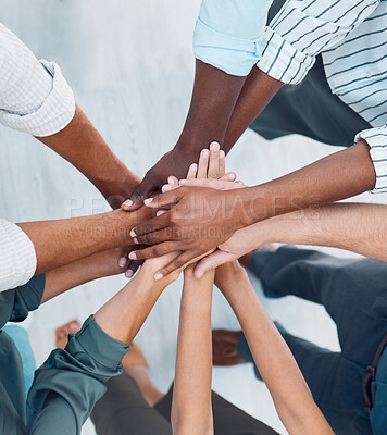 Buy stock photo Diversity, hands and team above in support, trust and unity for collaboration, agreement or meeting at the office. Group hand of diverse people in teamwork, cooperation and solidarity for community