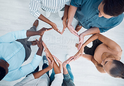 Buy stock photo Diversity, hands and business people in support for love, care and community in solidarity at the office. Group hand of employee workers in teamwork, collaboration and unity above in heart shape sign