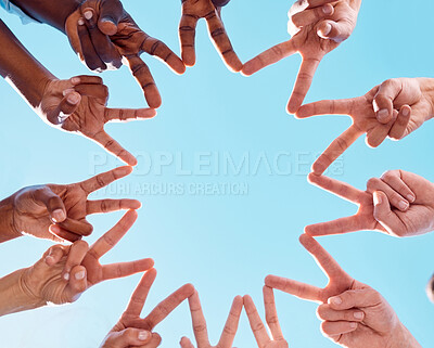 Buy stock photo Peace star sign, people and hands of people together with diversity showing support and community. Below view of friends in the outdoor and blue sky show solidarity, friendship and collaboration