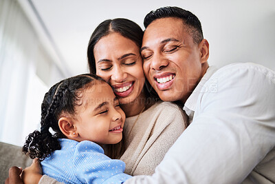 Buy stock photo Family hug, happy love and parents with smile for child on sofa in home, care for kid and excited about weekend together in the living room. Girl hugging dad and mom while relax on couch in a lounge