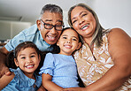 Black family, grandparents and portrait with children while happy, love and bonding in home together. Elderly, man and woman with kids, girl and happiness for smile, care and vacation in living room
