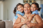 Relax, smile and grandma with children on sofa for family, happy and love together. Retirement, hug and wellness with portrait of old woman and kids in living room for lifestyle, mothers day and care