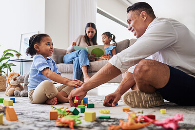 Buy stock photo Learning, education and family play with blocks with father and creative daughter playing together in living room. Childhood, development or parent, mother or mom reading story book to girl on sofa

